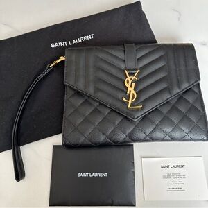 SOLD- Authentic Envelope Flap YSL Clutch Bag in Grained Leather. Black & gold.